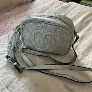 NWOT Silver women’s crossbody bag